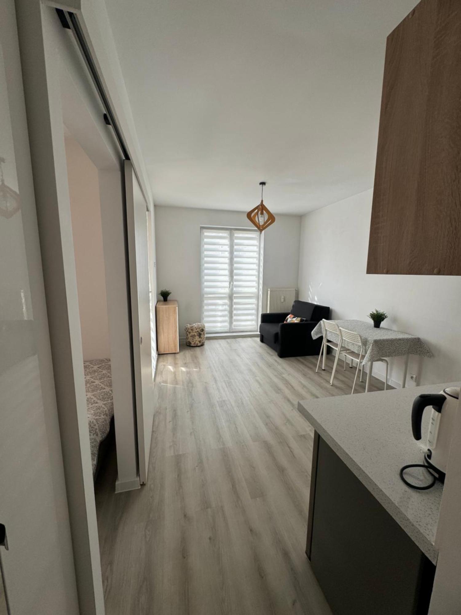 Апартаменты Apartament Katowicka Познань Экстерьер фото